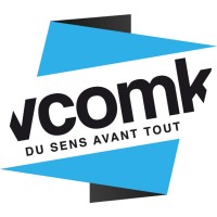 VCOMK logo, VCOMK contact details