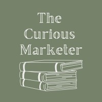 The Curious Marketer logo, The Curious Marketer contact details