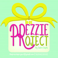 The Prezzie Project logo, The Prezzie Project contact details