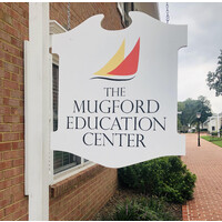 The Mugford Education Center logo, The Mugford Education Center contact details