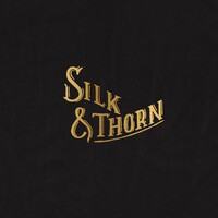 Silk & Thorn logo, Silk & Thorn contact details