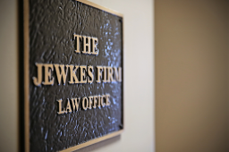 The Jewkes Firm logo, The Jewkes Firm contact details