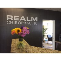 Realm Chiropractic logo, Realm Chiropractic contact details